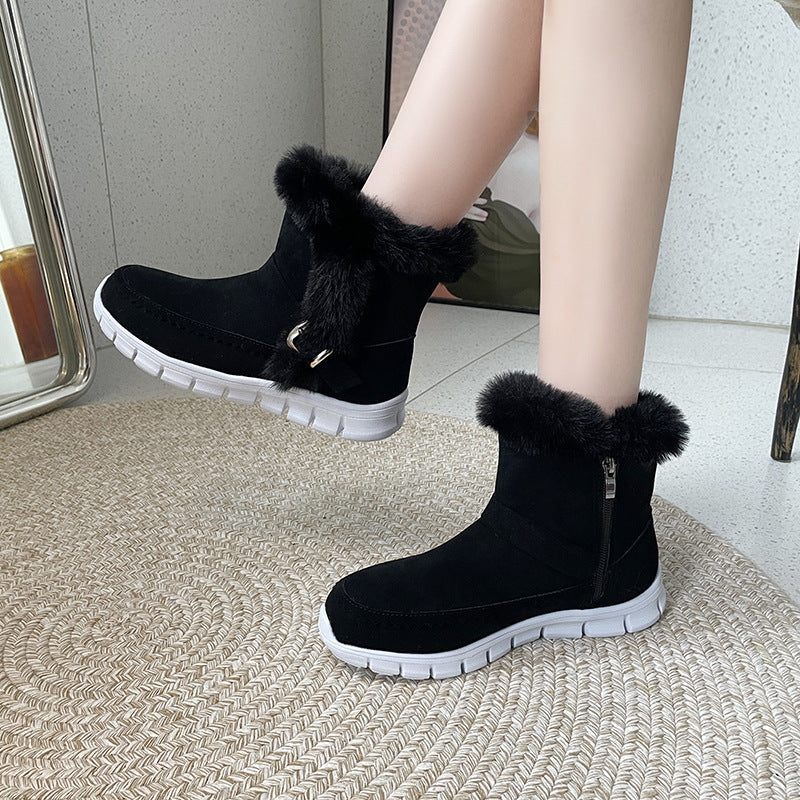 Schwarze Winterstiefel mit Kunstfell, rutschfeste Sohle und Reißverschluss. Perfekt für Damenmode, warm und stilvoll für kalte Tage.