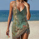 Sommerkleid mit Blumenmuster, ärmellos, V-Ausschnitt, ideal für Strandmode. Perfekt für Damen, die stilvolle und bequeme Sommerkleidung suchen.