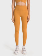 Damen-Sportleggings in Senfgelb, hoch tailliert, ideal für Fitness und Yoga. Bequeme Passform, atmungsaktives Material, modisch und funktional.