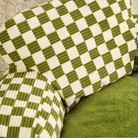 Grün-weiß kariertes Haustierbett, weiches Material, bequem, modernes Design.