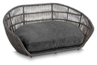 Graues Hundebett aus Rattan mit Kissen, modernes Design, Haustiermöbel, bequem und stilvoll.