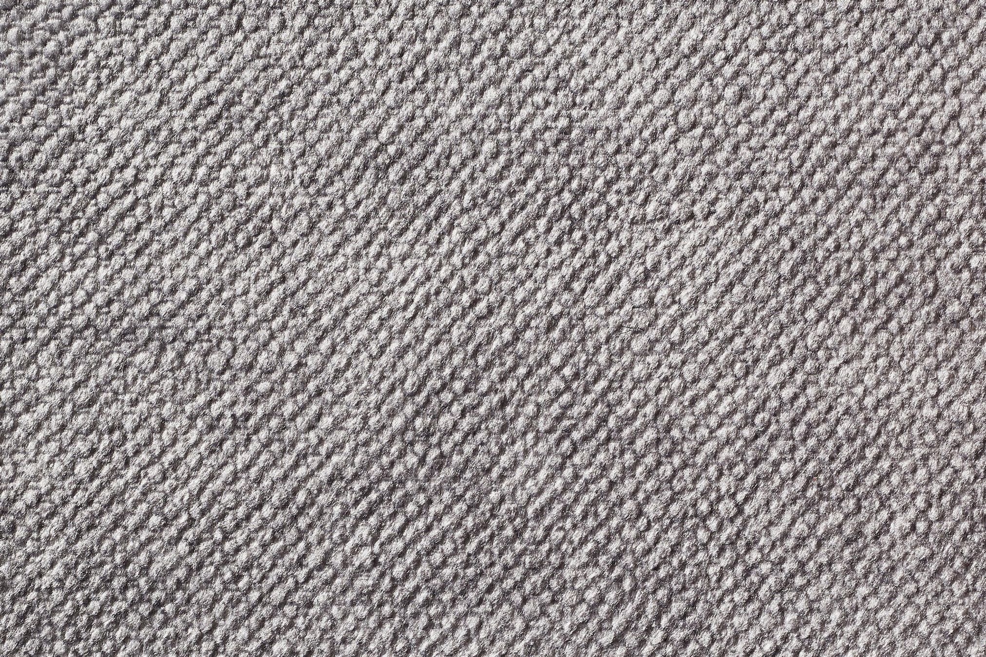 Grauer Teppichboden, Nahaufnahme, Textur, weiche Oberfläche, modernes Design, Wohnkultur.