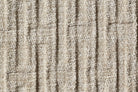 Beigefarbener Teppich mit strukturierter Oberfläche, modernes Design, Wohnzimmerteppich.