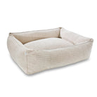 Beiges Hundebett aus Stoff, rechteckig, gemütlich, waschbar, ideal für kleine bis mittelgroße Hunde.