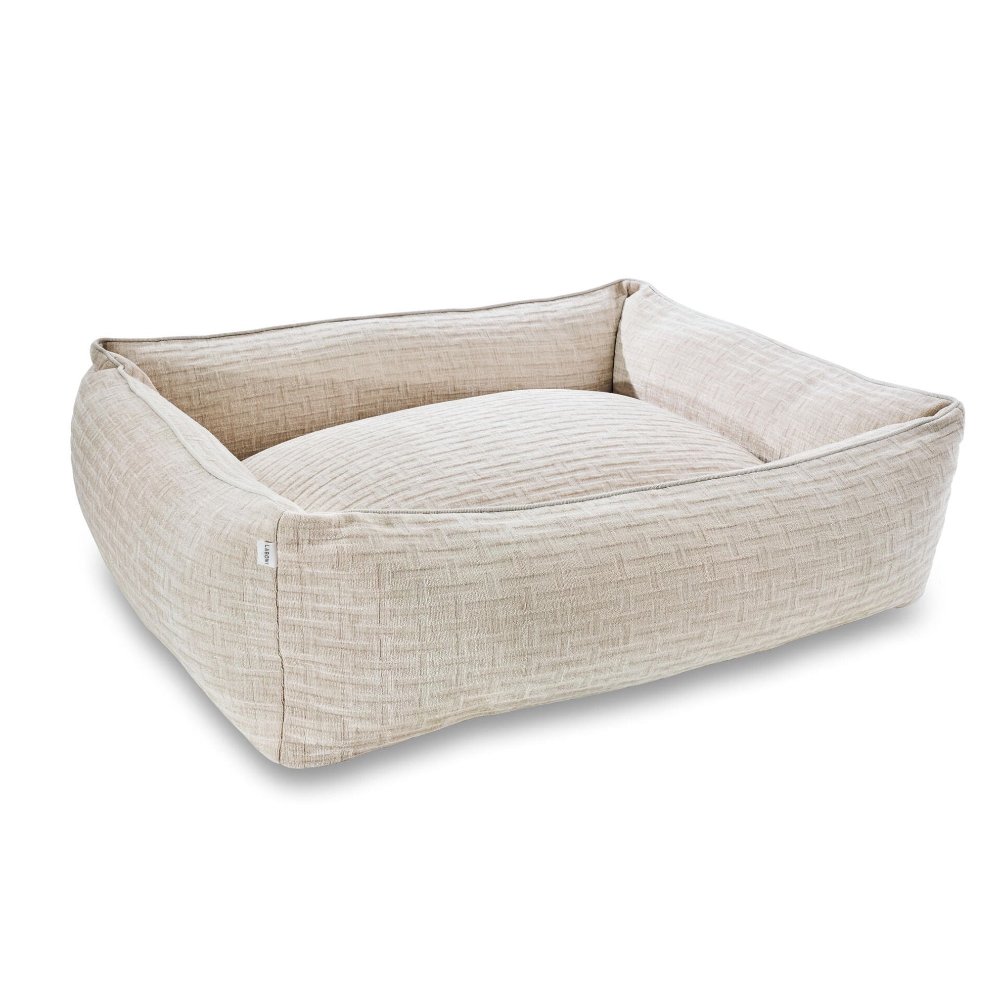 Beiges Hundebett aus Stoff, rechteckig, gemütlich, waschbar, ideal für kleine bis mittelgroße Hunde.