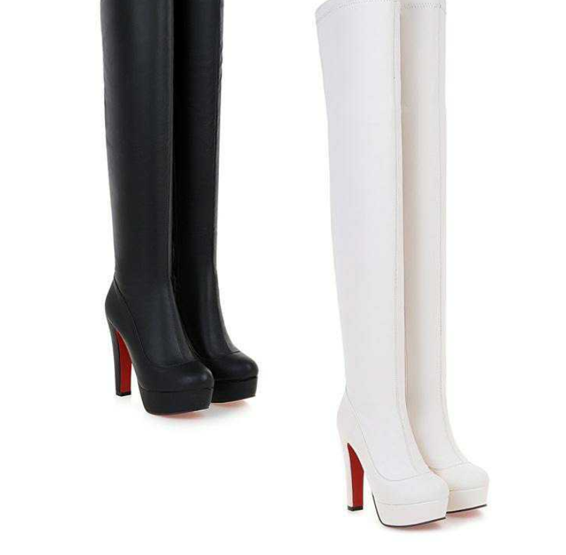 Schwarze und weiße Overknee-Stiefel mit hohem Absatz, elegantes Design, ideal für Damenmode, stilvolle Schuhe, trendige Stiefel für Herbst/Winter.