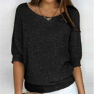 Damenpullover in Schwarz, lässiger Strick, 3/4-Ärmel, Rundhalsausschnitt, ideal für Herbstmode. Perfekt für stilvolle Freizeitoutfits.