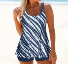 Damen-Tankini mit blau-weißem Streifenmuster, ideal für Strandmode. Bequeme Passform, modisch und perfekt für den Sommerurlaub.