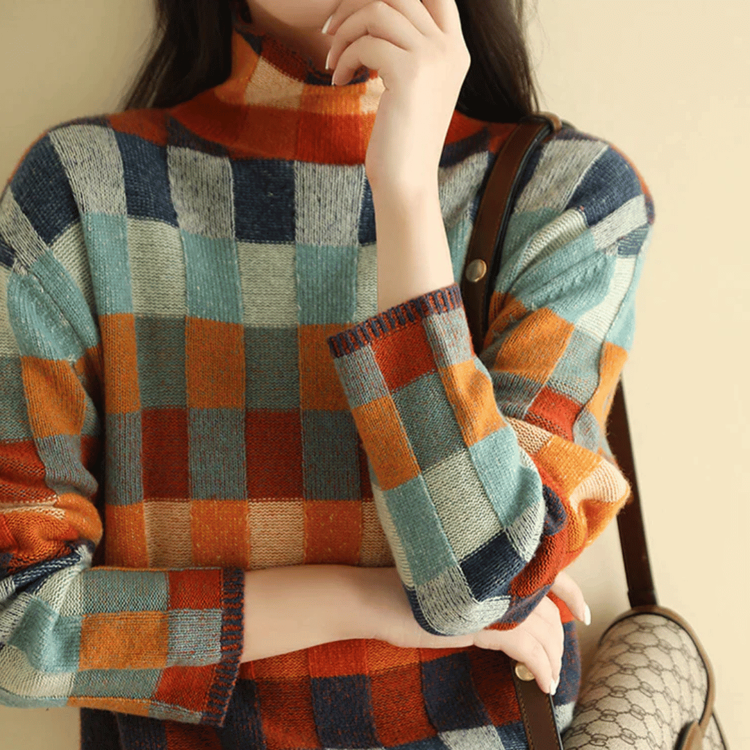 Farbiger Karo-Pullover für Damen, modisch und warm. Perfekt für Herbst und Winter. Hochwertige Strickmode, ideal für stilvolle Outfits.