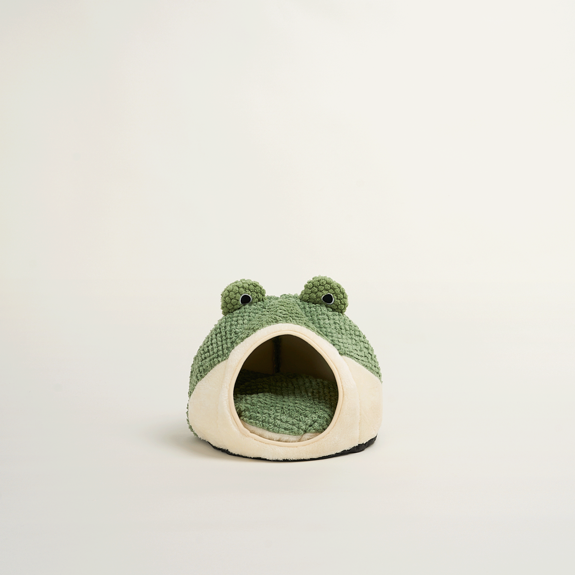 Grünes Frosch-Katzenbett aus Plüsch, gemütlich, Höhlenform, für Haustiere, dekorativ.