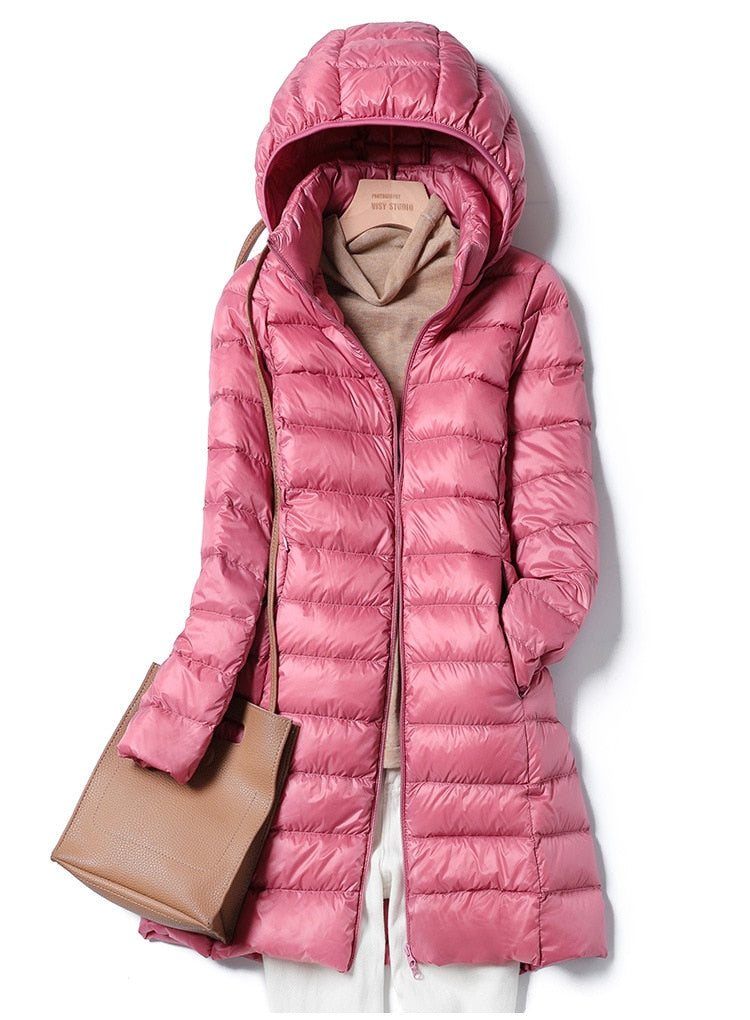 Damen Winterjacke in Rosa mit Kapuze, gesteppt, warm gefüttert. Perfekt für kalte Tage. Modisch und funktional. Ideal für den Winter.