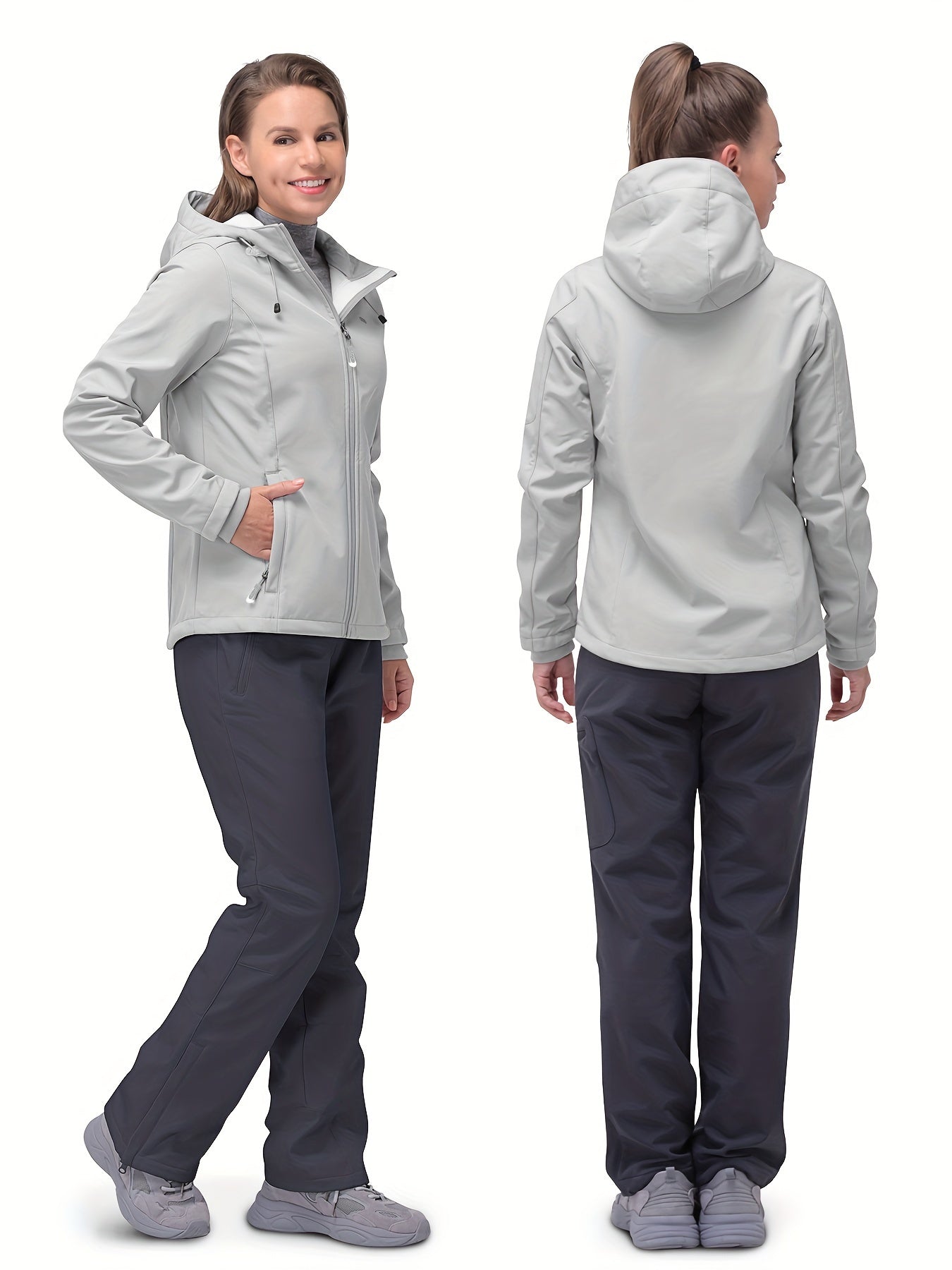 Damen-Softshelljacke in Hellgrau, wasserabweisend, atmungsaktiv, mit Kapuze und Reißverschlusstaschen. Perfekt für Outdoor-Aktivitäten.