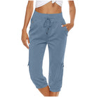 Damen Caprihose in Blau, lässig und bequem, mit Kordelzug und Seitentaschen. Perfekt für Freizeit und Sport. Hochwertige Sommermode.