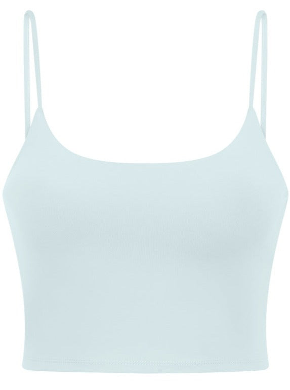 Damen Crop-Top in Pastellblau, Spaghettiträger, nahtloses Design, ideal für Sommermode, bequem und stilvoll, vielseitig kombinierbar.