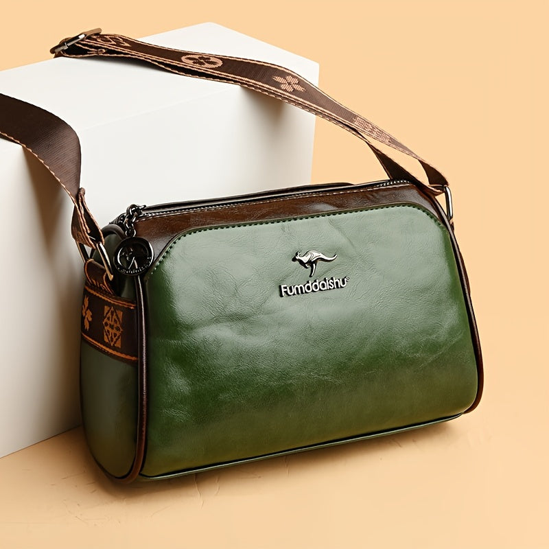 Grüne Ledertasche mit verstellbarem Schulterriemen, elegantes Design, ideal für Damen. Perfekt für Alltag und Reisen. Hochwertige Handtasche.