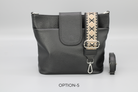 Schwarze Lederhandtasche mit abnehmbarem, gemustertem Schulterriemen. Stilvoll, modern, vielseitig. Perfekt für Alltag und besondere Anlässe.