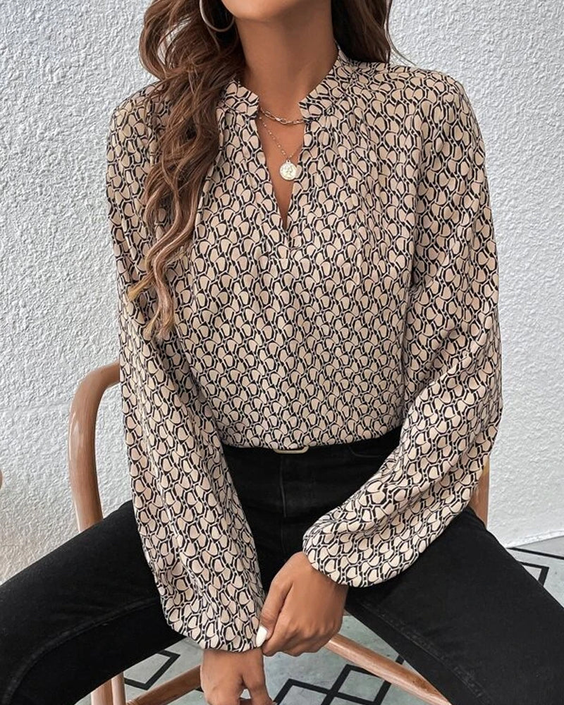 Damenbluse mit geometrischem Muster, lange Ärmel, V-Ausschnitt, modisch und elegant, ideal für Büro und Freizeit, trendige Damenmode.