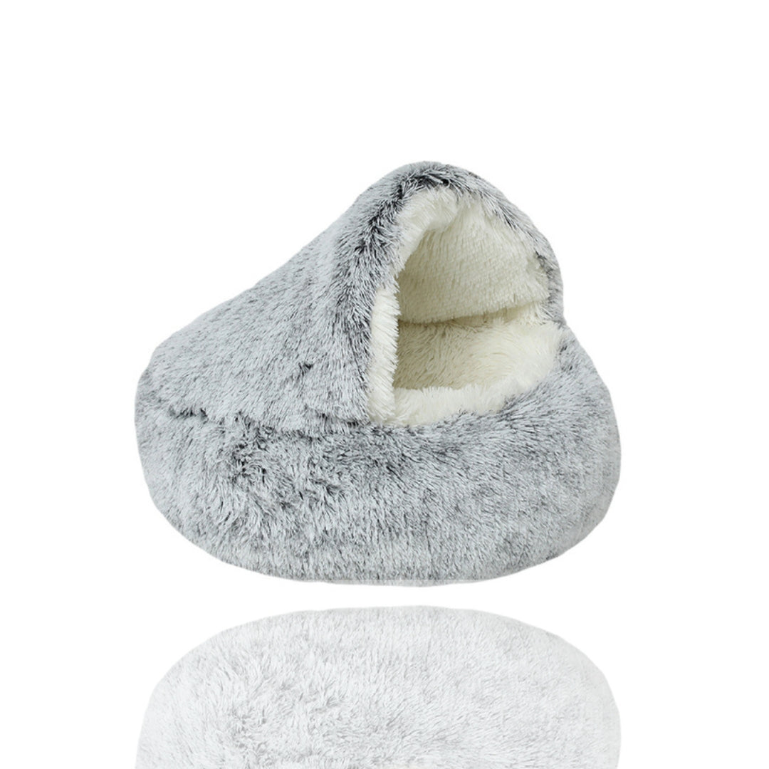 Kuscheliges, graues Katzenbett aus Plüsch mit Höhlendesign, ideal für Haustiere. Weiches, warmes Material für maximalen Komfort und Geborgenheit.