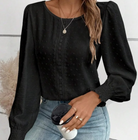 Elegante schwarze Bluse mit Spitzenmuster, langen Puffärmeln und Rundhalsausschnitt. Perfekt für Damenmode, stilvoll und modern.