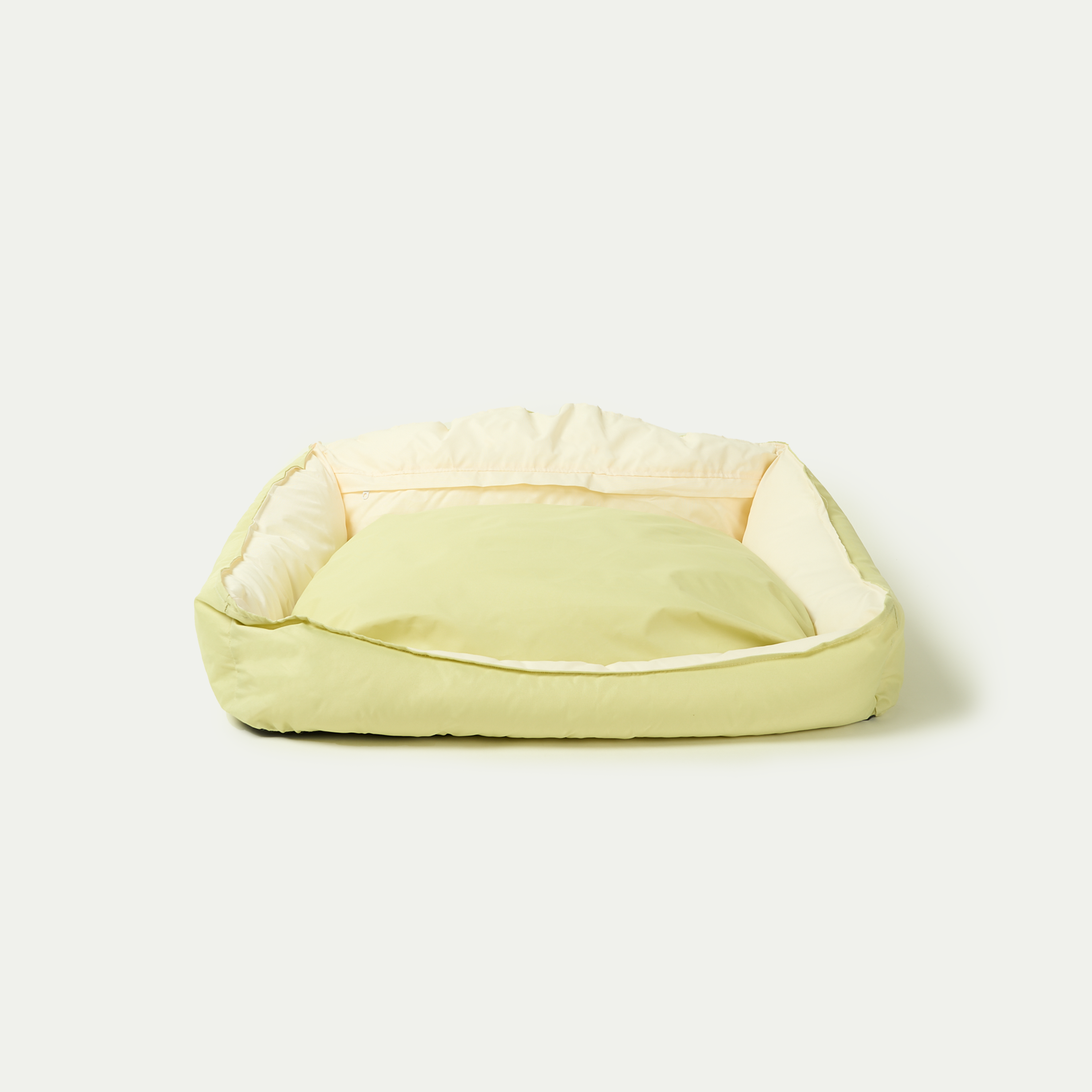Grünes Hundebett, quadratisch, weiches Material, ideal für tiefen Schlaf, Haustierbedarf.