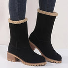Schwarze Damenstiefel mit Blockabsatz und Fellfutter, ideal für Wintermode. Bequeme, stilvolle Stiefel für kalte Tage. Perfekt für Outdoor-Aktivitäten.