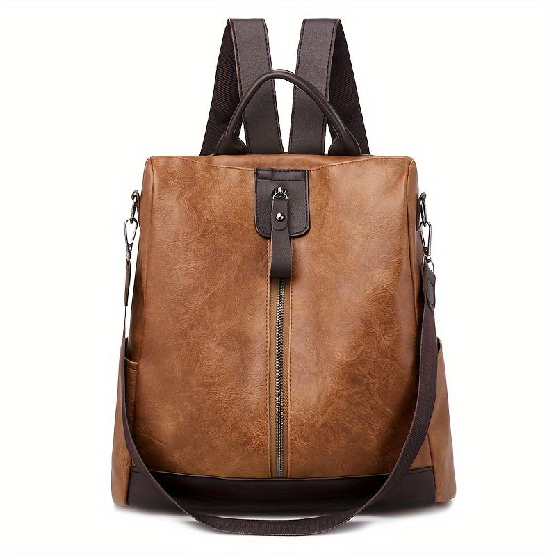 Brauner Leder-Rucksack mit Reißverschluss, verstellbaren Trägern und Fronttasche. Stilvoller Damen-Rucksack, ideal für Alltag und Reisen.