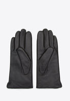 Schwarze Lederhandschuhe für Herren, elegant und zeitlos. Perfekt für Wintermode, bieten Komfort und Stil. Hochwertiges Leder, ideal für kalte Tage.