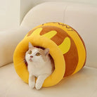 Katzenbett in Honigtopf-Design, gemütlich und weich, ideal für Katzenliebhaber. Perfektes Haustierbett für Komfort und Stil im Wohnzimmer.