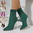 Grüne Stiefeletten mit transparentem Absatz, modisch und elegant. Perfekt für Damenmode, Herbsttrends und stilvolle Outfits.