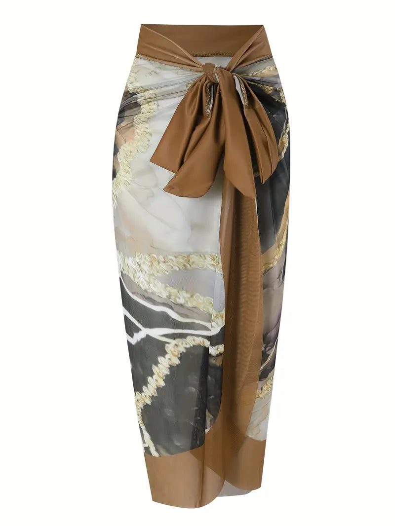 Eleganter Wickelrock mit abstraktem Muster, braunem Knoten-Detail, ideal für Sommermode. Perfekt für Strand, Urlaub und Freizeit.