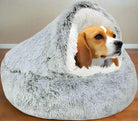 Gemütliches Hundebett in Höhlenform aus weichem, grauem Plüsch. Ideal für kleine bis mittelgroße Hunde. Perfekt für Komfort und Wärme.