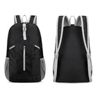 Schwarzer Rucksack, leicht, wasserabweisend, mit grauen Akzenten, ideal für Reisen und Alltag.