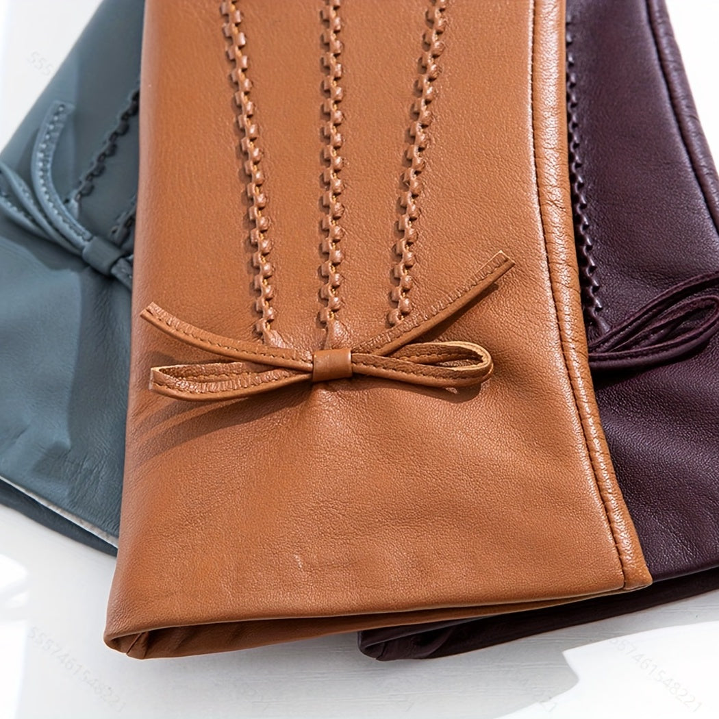Braune Lederhandschuhe mit Ziernähten und Schleife, elegante Damenmode Accessoires.