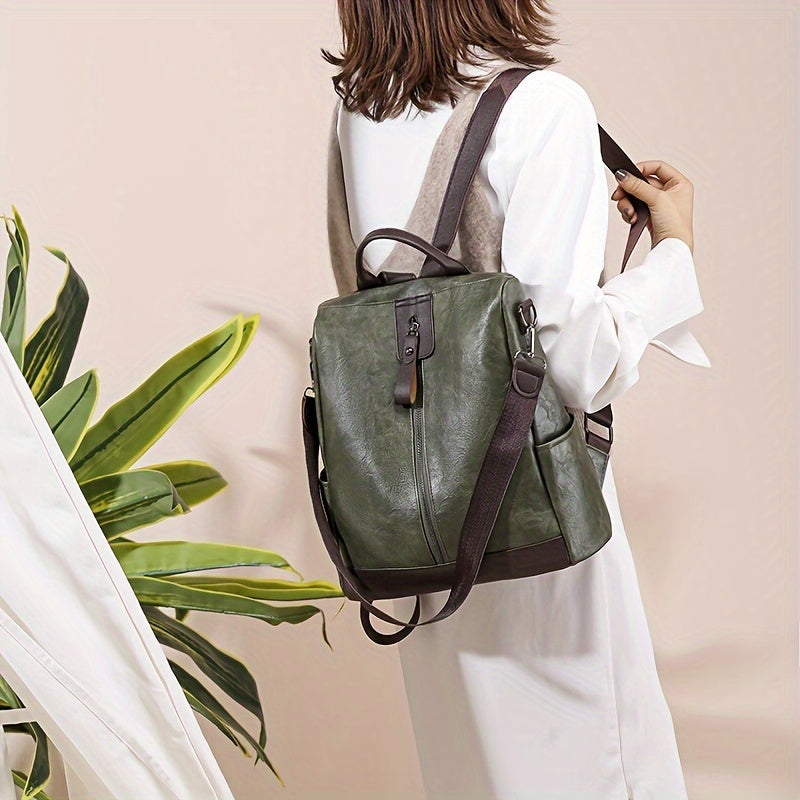Damen-Rucksack aus grünem Leder, stilvoll und modern, ideal für Alltag und Reisen. Hochwertige Verarbeitung, modisches Accessoire.