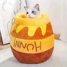 Kuscheliges Katzenbett in Honigtopf-Design, ideal für Haustiere. Weiches Plüschmaterial, perfekter Rückzugsort für Katzen. Haustierbett, Katzenzubehör.