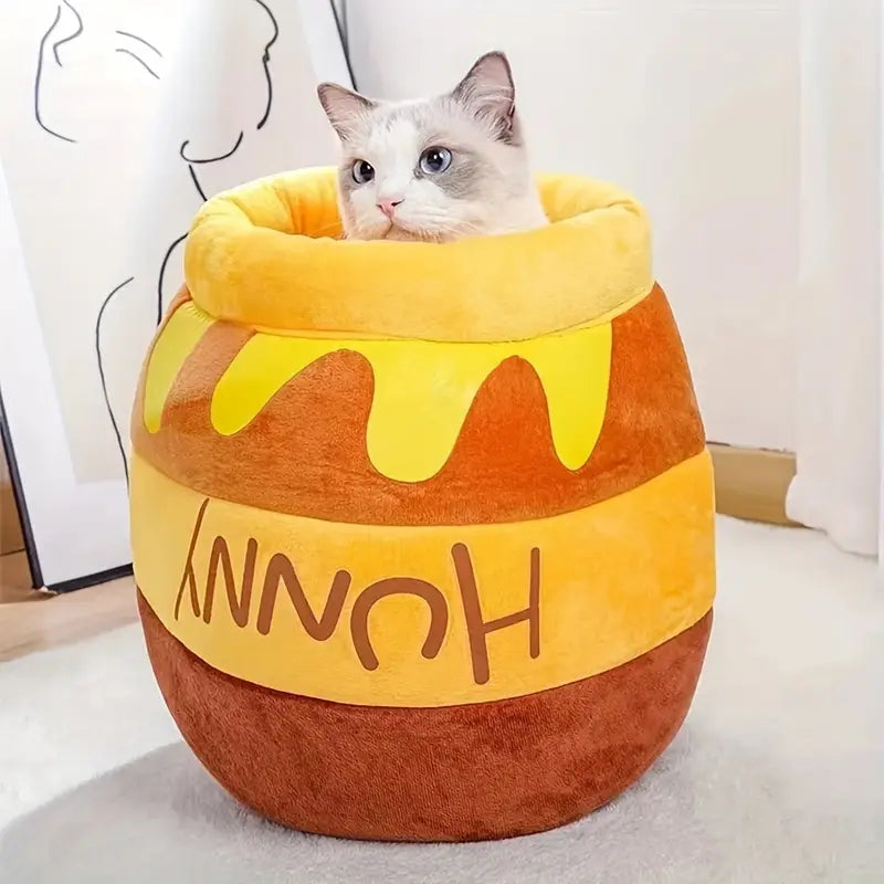Kuscheliges Katzenbett in Honigtopf-Design, ideal für Haustiere. Weiches Plüschmaterial, perfekter Rückzugsort für Katzen. Haustierbett, Katzenzubehör.