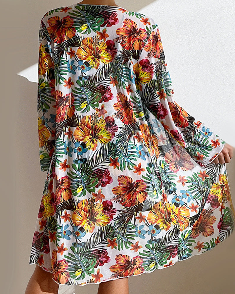Frau in geblümtem Sommerkleid, bunte Blumenmuster, tropisches Design, Freizeitmode.