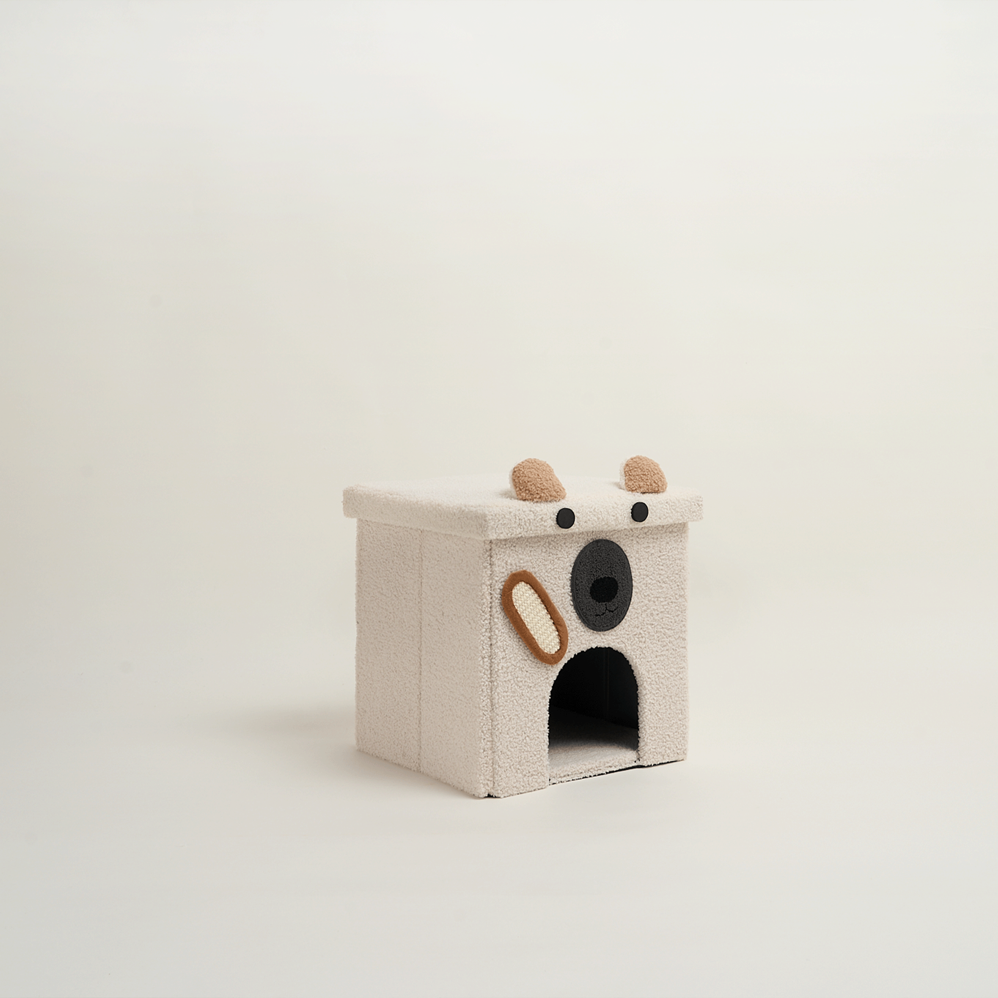 Beige Hundehütte aus Stoff, quadratisch, mit Ohren-Design, für kleine Haustiere.