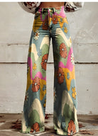 Bunte Schlaghose mit Blumenmuster, Retro-Design, ideal für Vintage-Mode, Damenbekleidung, 70er-Jahre-Stil, auffällige Freizeitkleidung.