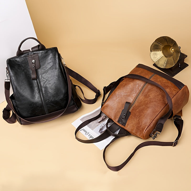 Zwei stilvolle Lederrucksäcke in Schwarz und Braun auf beigem Hintergrund, ideal für Mode und Reisen. Hochwertige Materialien, elegantes Design.