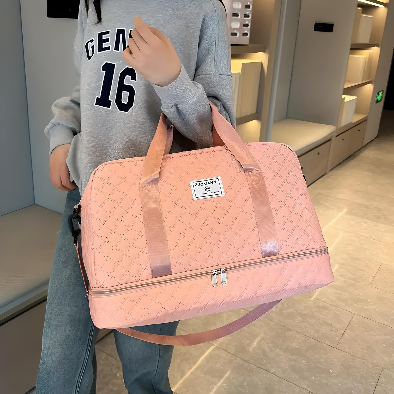 Damen Reisetasche rosa, gesteppt, mit Tragegriffen, Reißverschluss, sportlich, modisch.