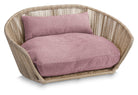 Rattan-Hundebett mit rosa Kissen, modernes Design, gemütlich, Haustiermöbel, langlebig.