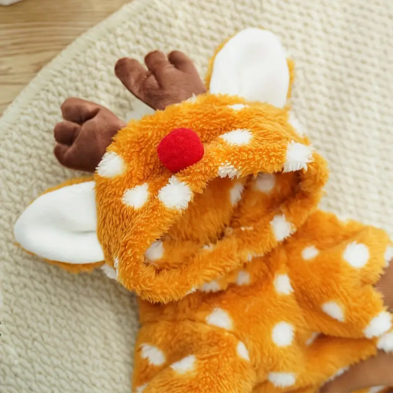 Kuscheliger Baby-Strampler im Rentier-Design mit Kapuze, weichem Plüschstoff und niedlichen Geweih-Details. Perfekt für Weihnachten und Winter.