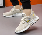Beige Sneaker mit atmungsaktivem Mesh-Obermaterial, rutschfester Sohle und modernem Design. Perfekt für Sport und Freizeit. Herrenmode, Laufschuhe.