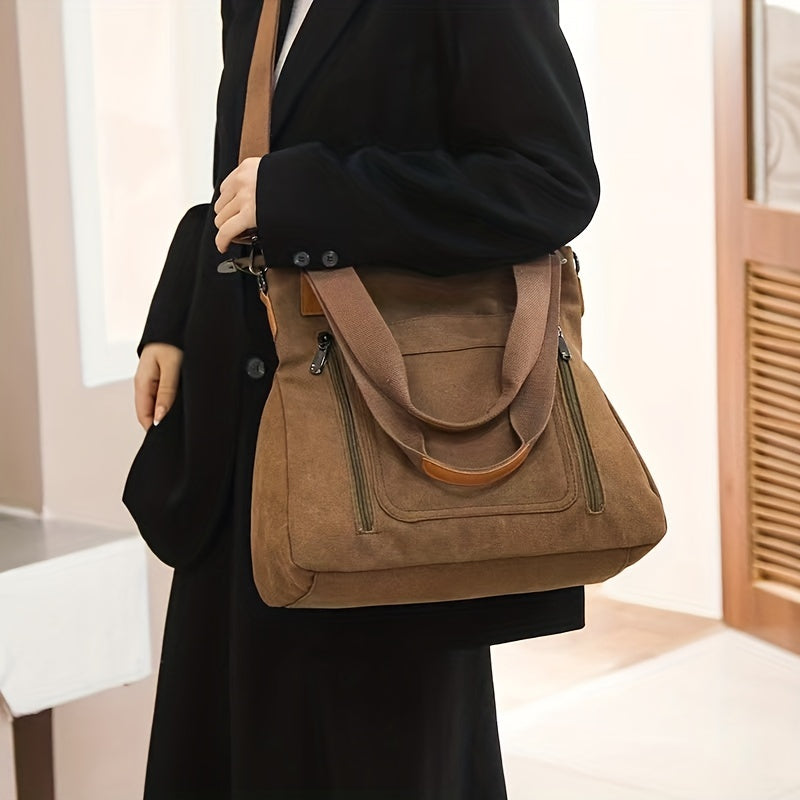 Damenhandtasche aus braunem Wildleder, elegant und geräumig, ideal für den Alltag. Modisches Accessoire für stilbewusste Frauen.