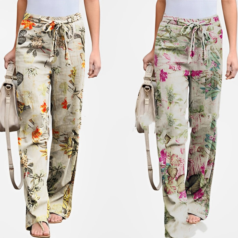 Damenhose mit floralem Muster, locker geschnitten, in Beige mit bunten Blumen. Perfekt für Sommermode, bequem und stilvoll.