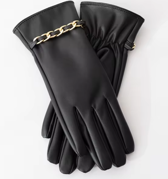 Elegante schwarze Lederhandschuhe mit goldener Kette, Damenmode, stilvolles Accessoire, hochwertiges Material, ideal für Herbst und Winter.