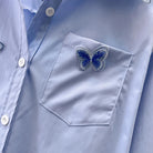 Damenbluse mit Schmetterlingsstickerei, langärmelig, Polokragen, vielseitig, ideal für Frühling. Elegante Mode, hochwertiges Design.
