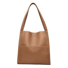 Elegante braune Ledertasche mit Schulterriemen, ideal für Damenmode. Hochwertiges Design, geräumig und stilvoll für den täglichen Gebrauch.