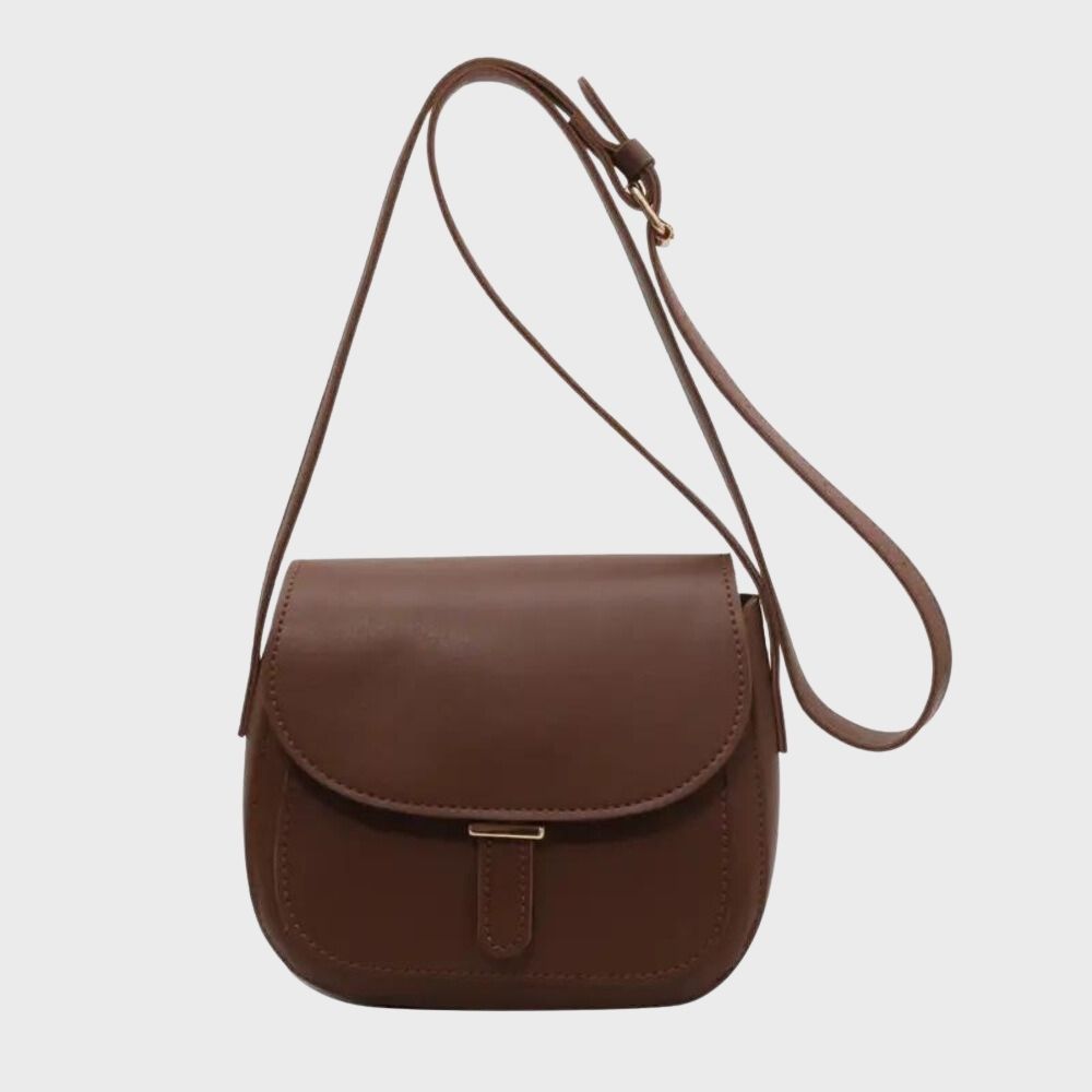 Braune Ledertasche mit verstellbarem Schulterriemen, klassisches Design, ideal für Damenmode, Accessoires, stilvoll und zeitlos.